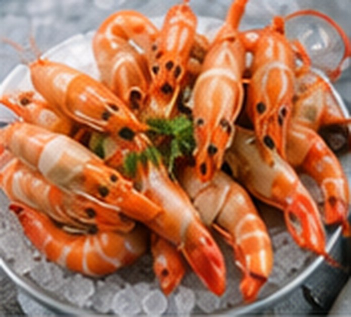 Large cooked king prawns on ice.