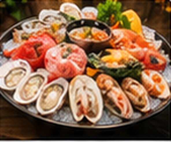 A mixed seafood platter of prawns, oysters and mussels.