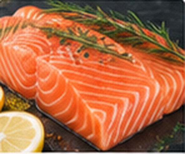 Fresh Tasmanian salmon fillet with rosemary and lemon.